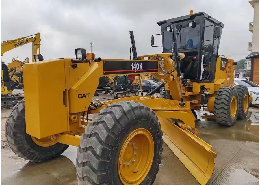 CAT 140K — автогрейдер