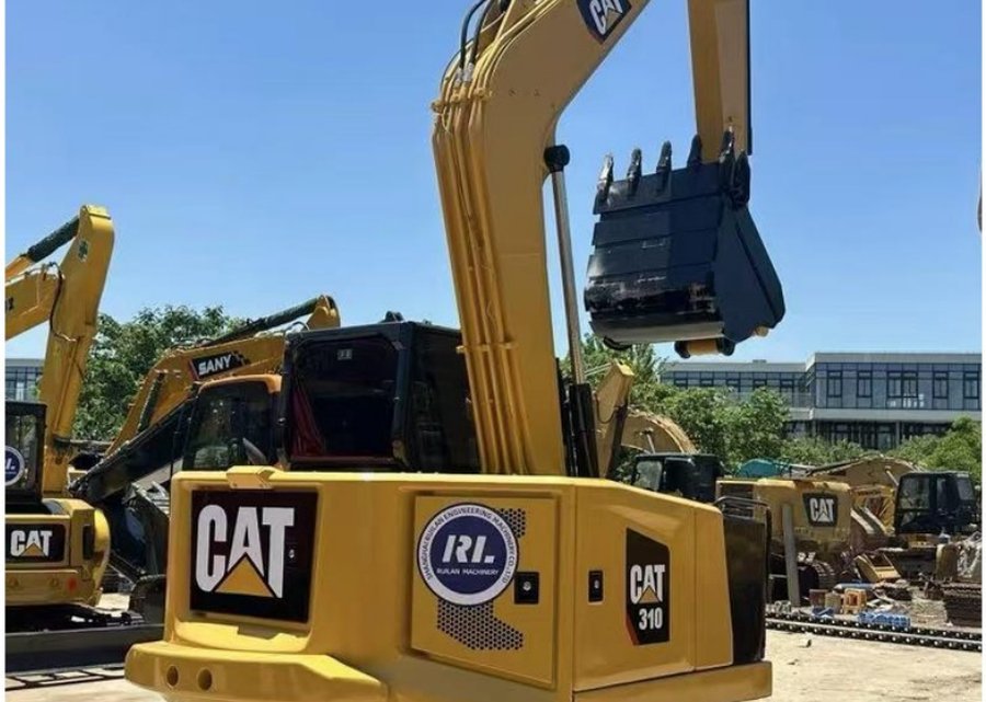 CAT 310 — гусеничный экскаватор